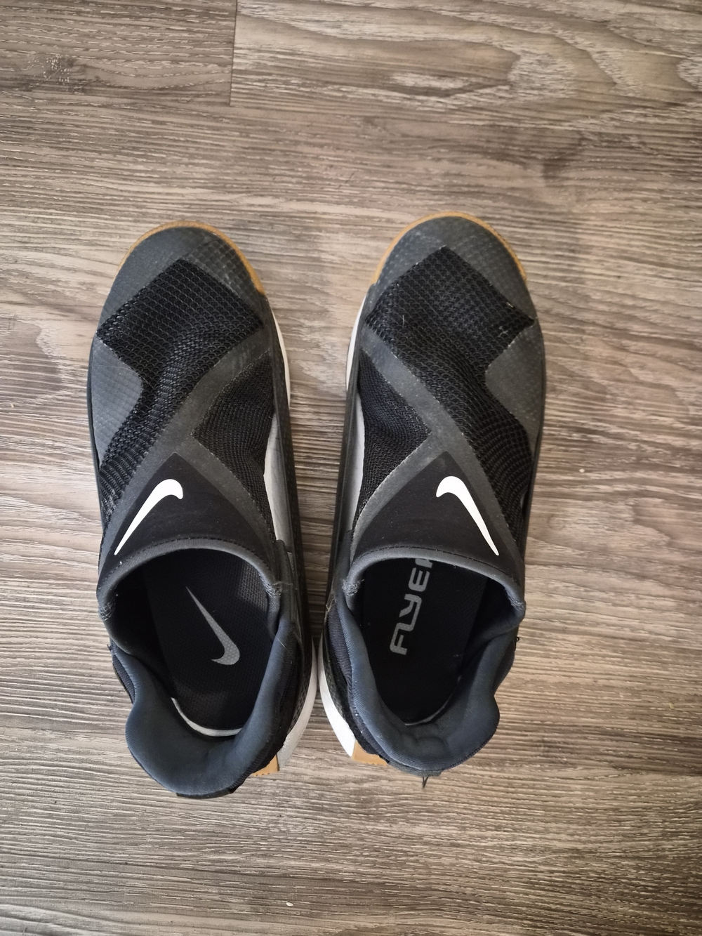 Nike Women’s Black and Gray Slip-On Athletic Trainers with Gum Outsole